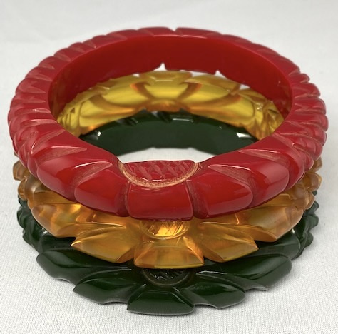 Heavily carved and oxidized dark marbled green bakelite bangle measures 1/2" wide X 2 1/2" wrist ope